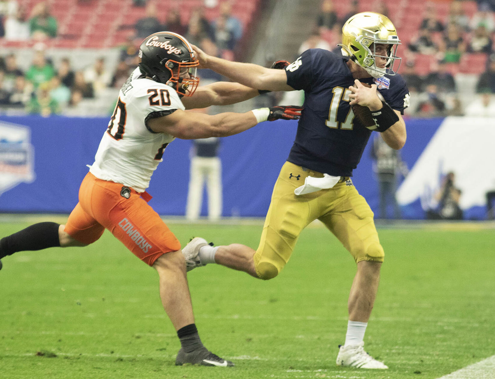Notre Dame against Oklahoma State, in the 2022 Playstation Fiesta Bowl